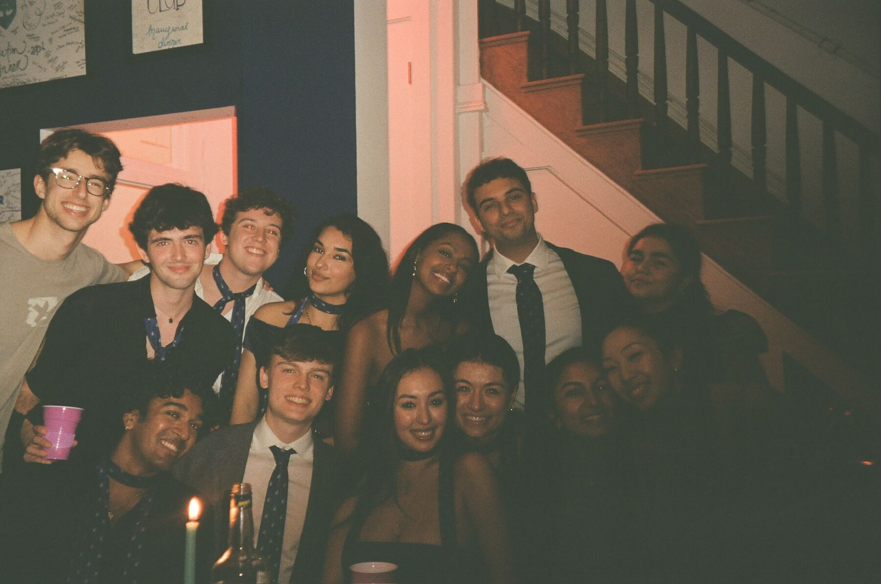 Members on the clubhouse stairs